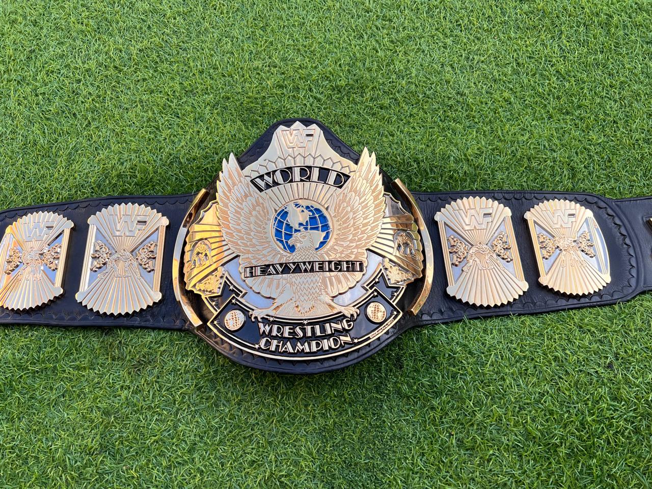 6mm CNC-crafted championship plates Brilliant 24K gold finish Detailed Winged Eagle design Upgraded leather strap Sealed leather edges